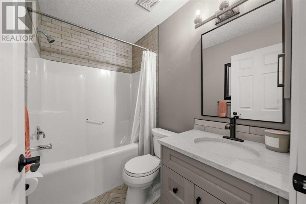 87 Hidden Creek Point Nw, Calgary, Alberta  T2A 6J7 - Photo 18 - A2227150