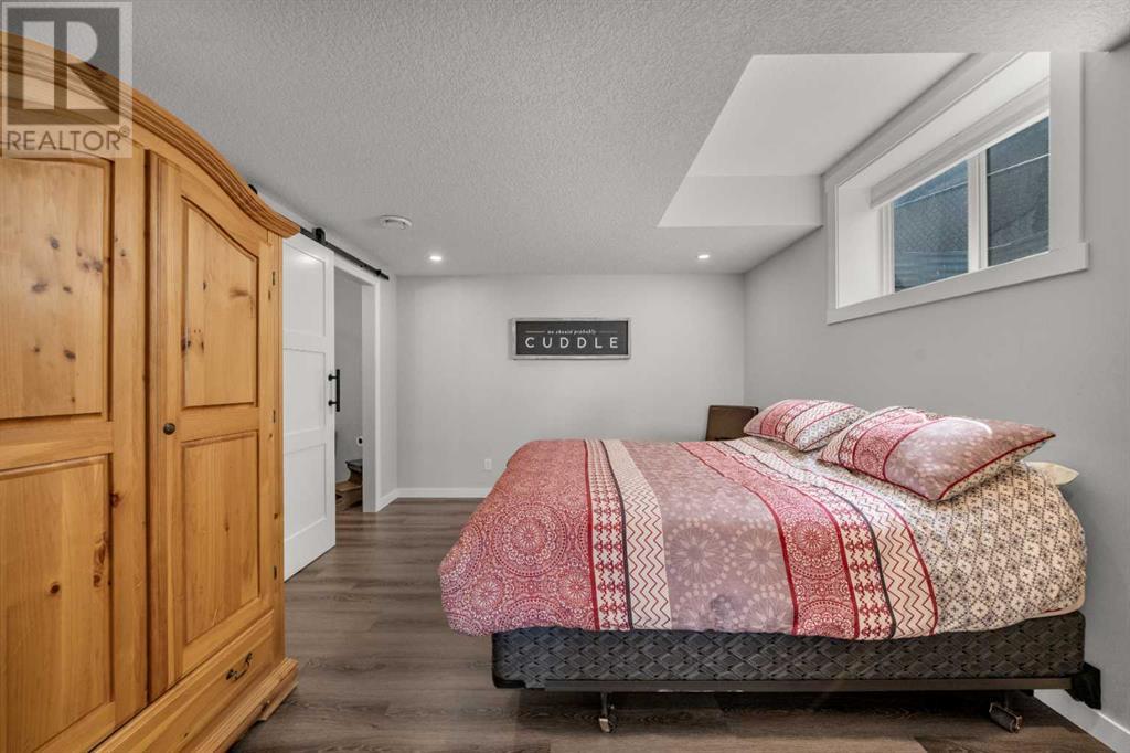 87 Hidden Creek Point Nw, Calgary, Alberta  T2A 6J7 - Photo 31 - A2227150