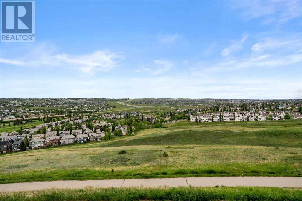 87 Hidden Creek Point Nw, Calgary, Alberta  T2A 6J7 - Photo 41 - A2227150