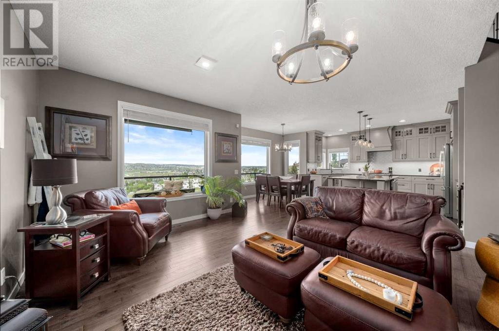 87 Hidden Creek Point Nw, Calgary, Alberta  T2A 6J7 - Photo 7 - A2227150