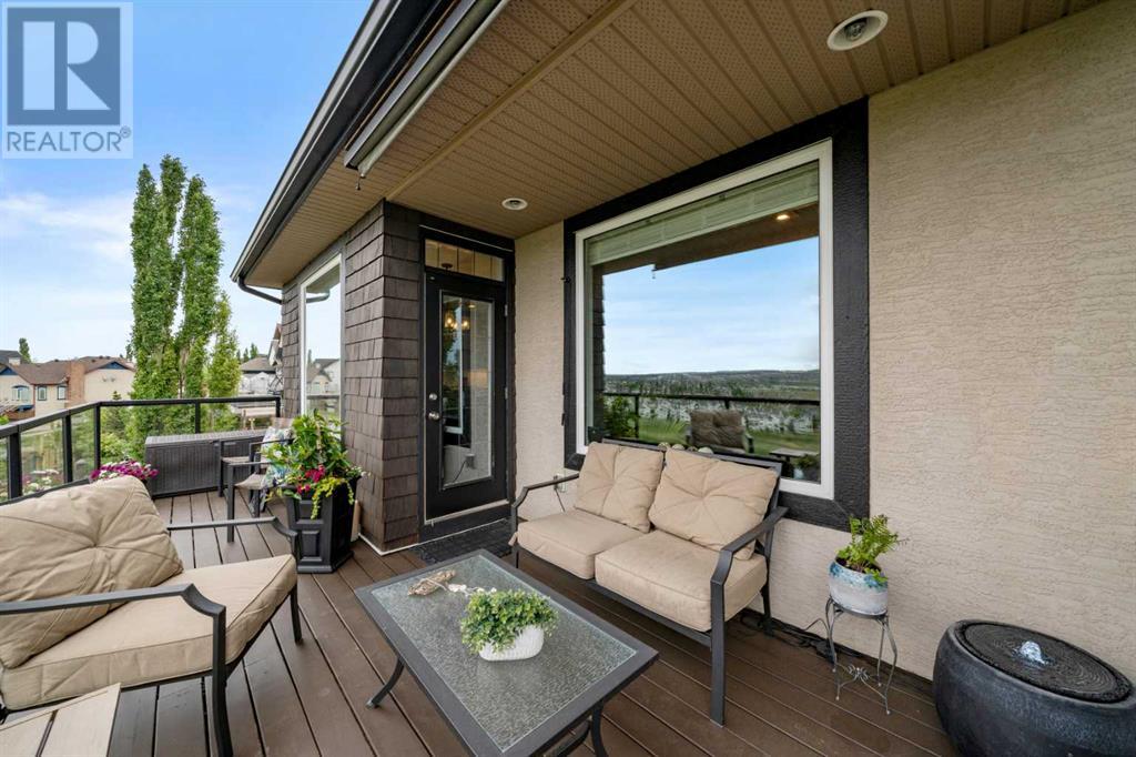 87 Hidden Creek Point Nw, Calgary, Alberta  T2A 6J7 - Photo 38 - A2227150