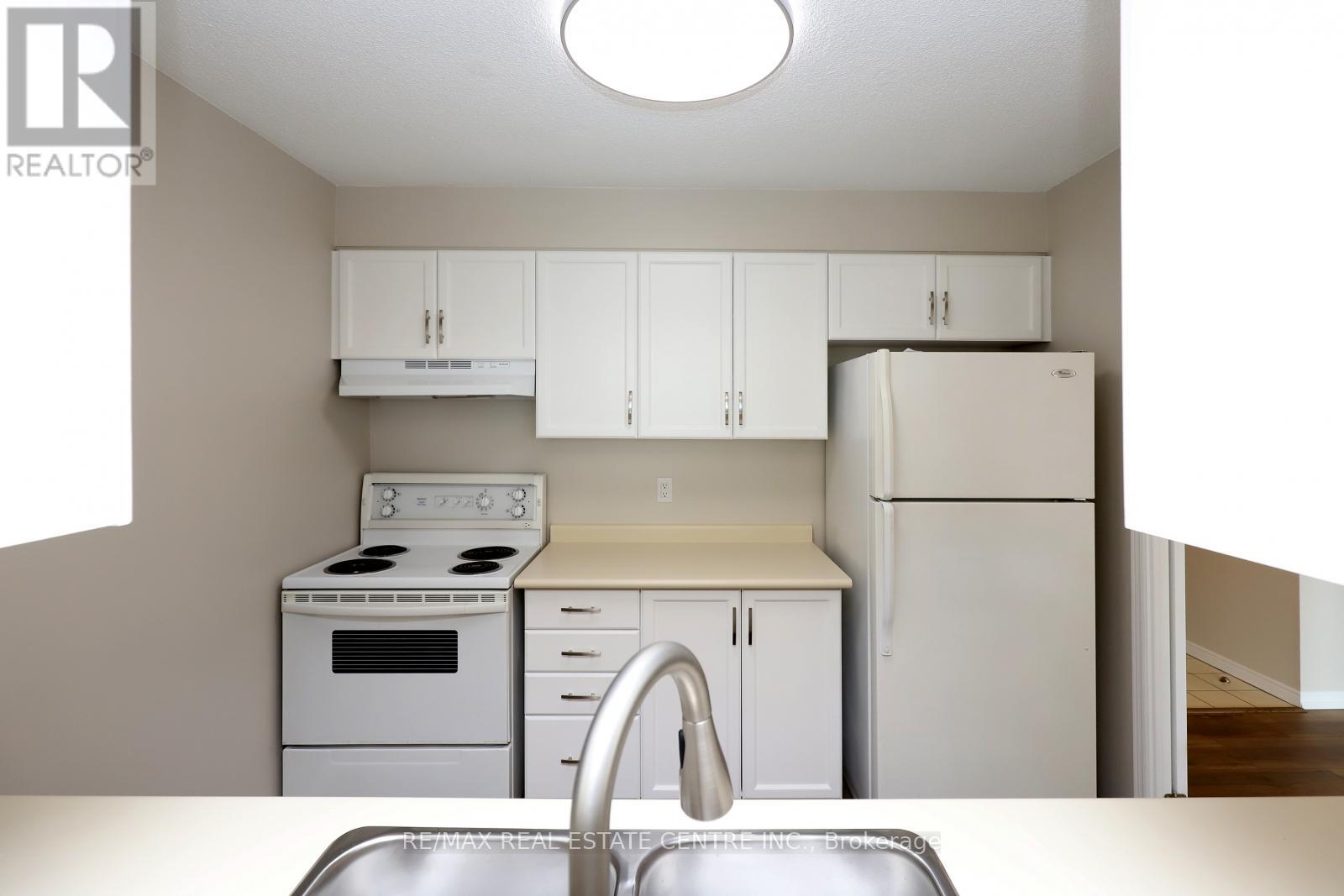 1201 - 100 Millside Drive, Milton (Om Old Milton), Ontario  L9T 5E2 - Photo 12 - W12213020