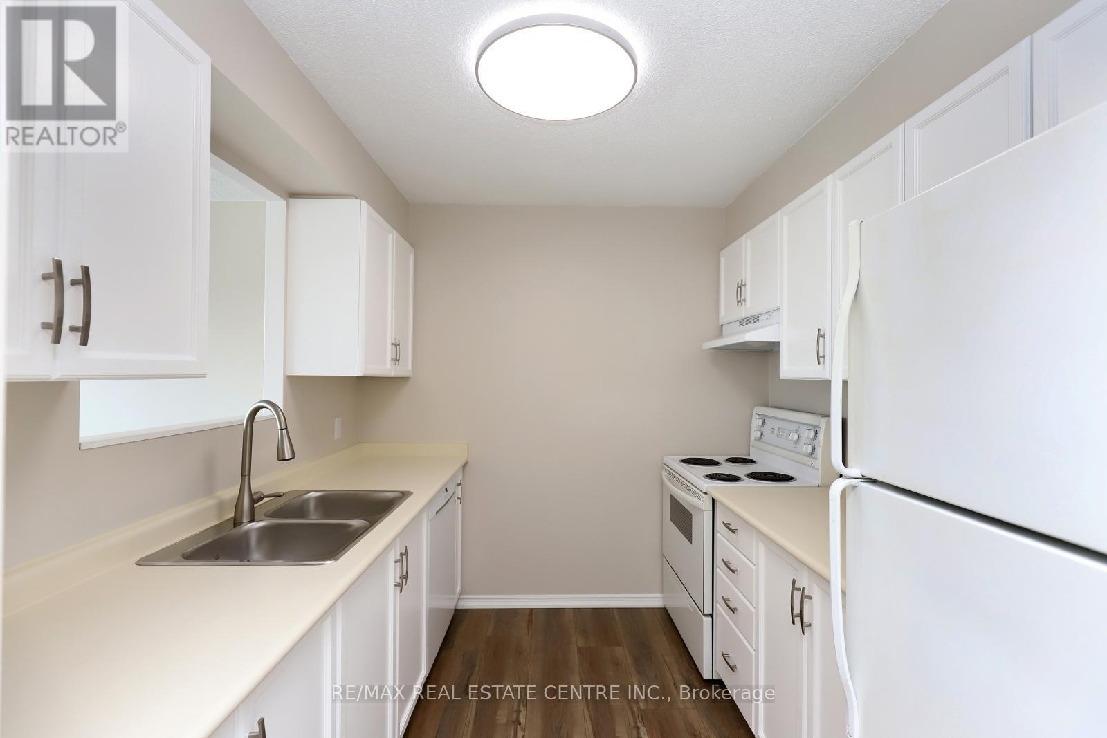 1201 - 100 Millside Drive, Milton (Om Old Milton), Ontario  L9T 5E2 - Photo 8 - W12213020