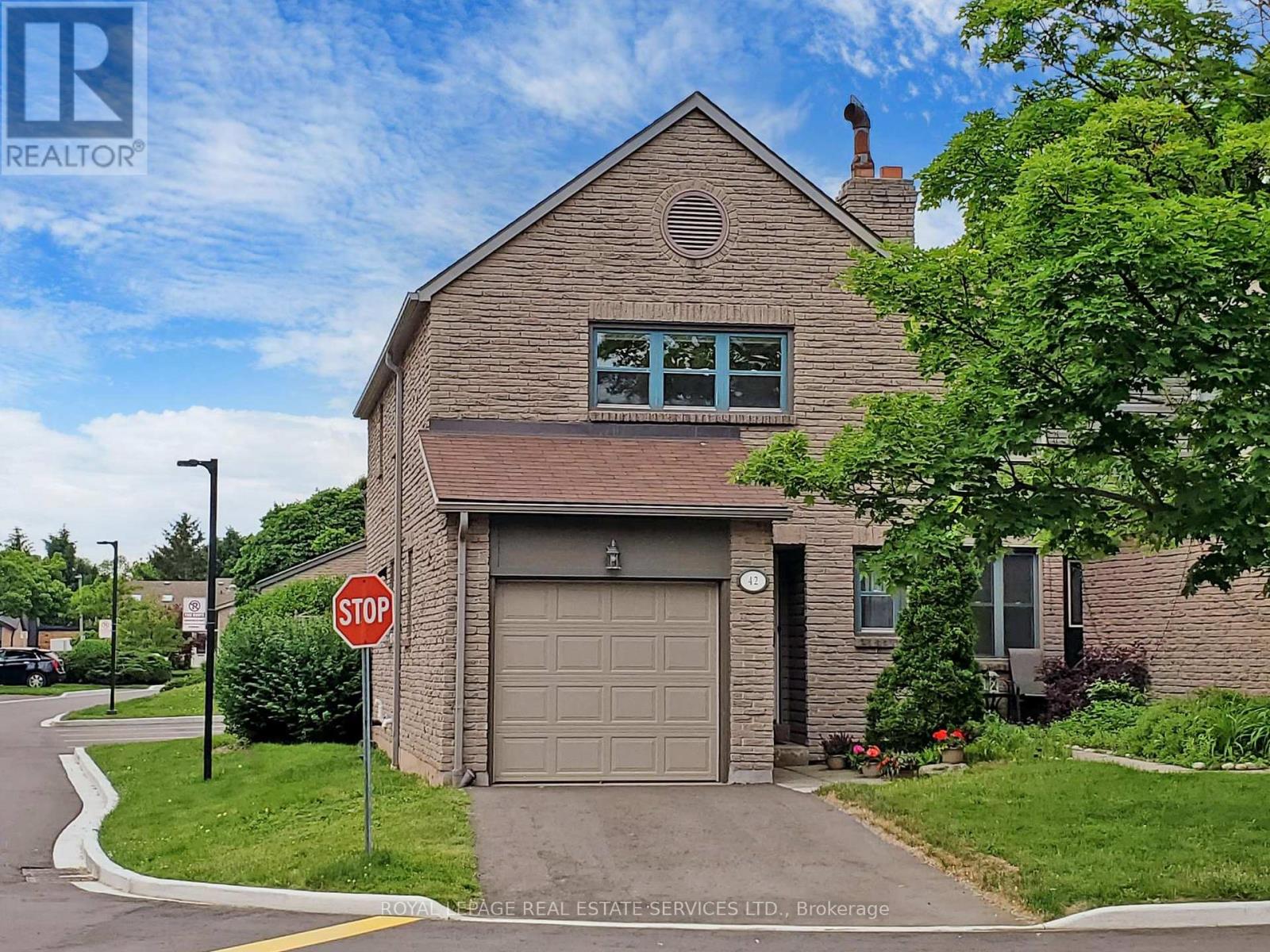 42 - 4111 Arbour Green Drive, Mississauga (Erin Mills), Ontario  L5L 2Z2 - Photo 1 - W12211257