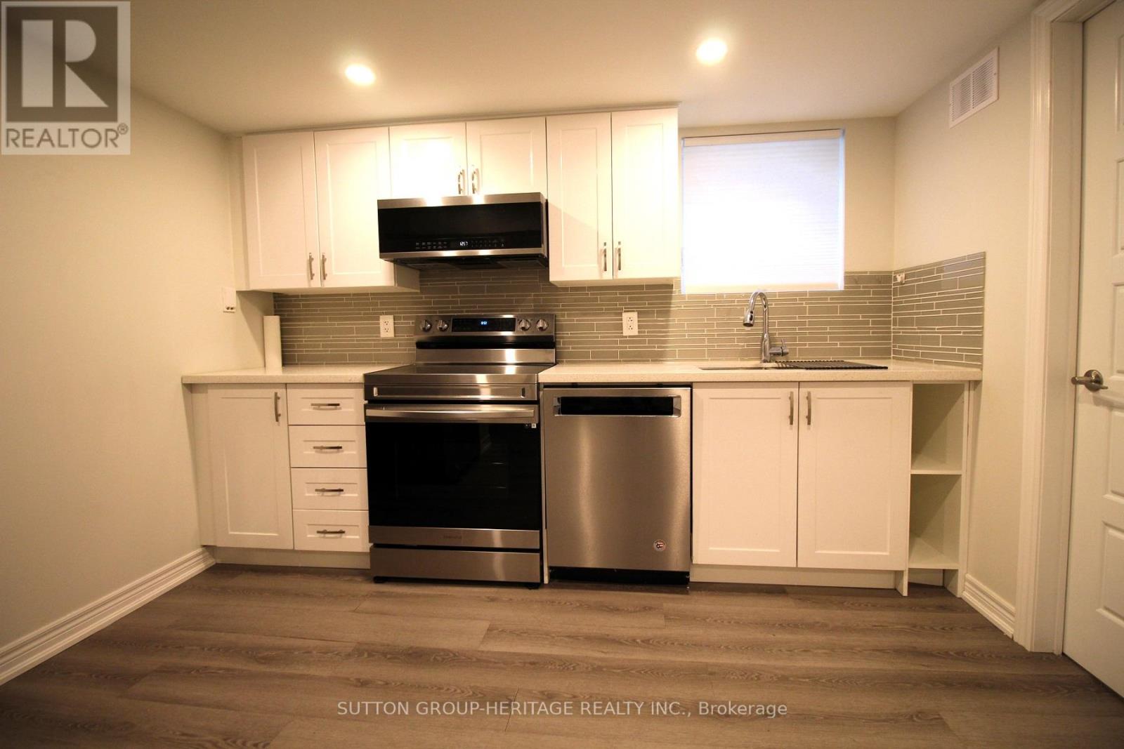 LOWER LEVEL - 36 BARTLEY DRIVE, Toronto, Ontario