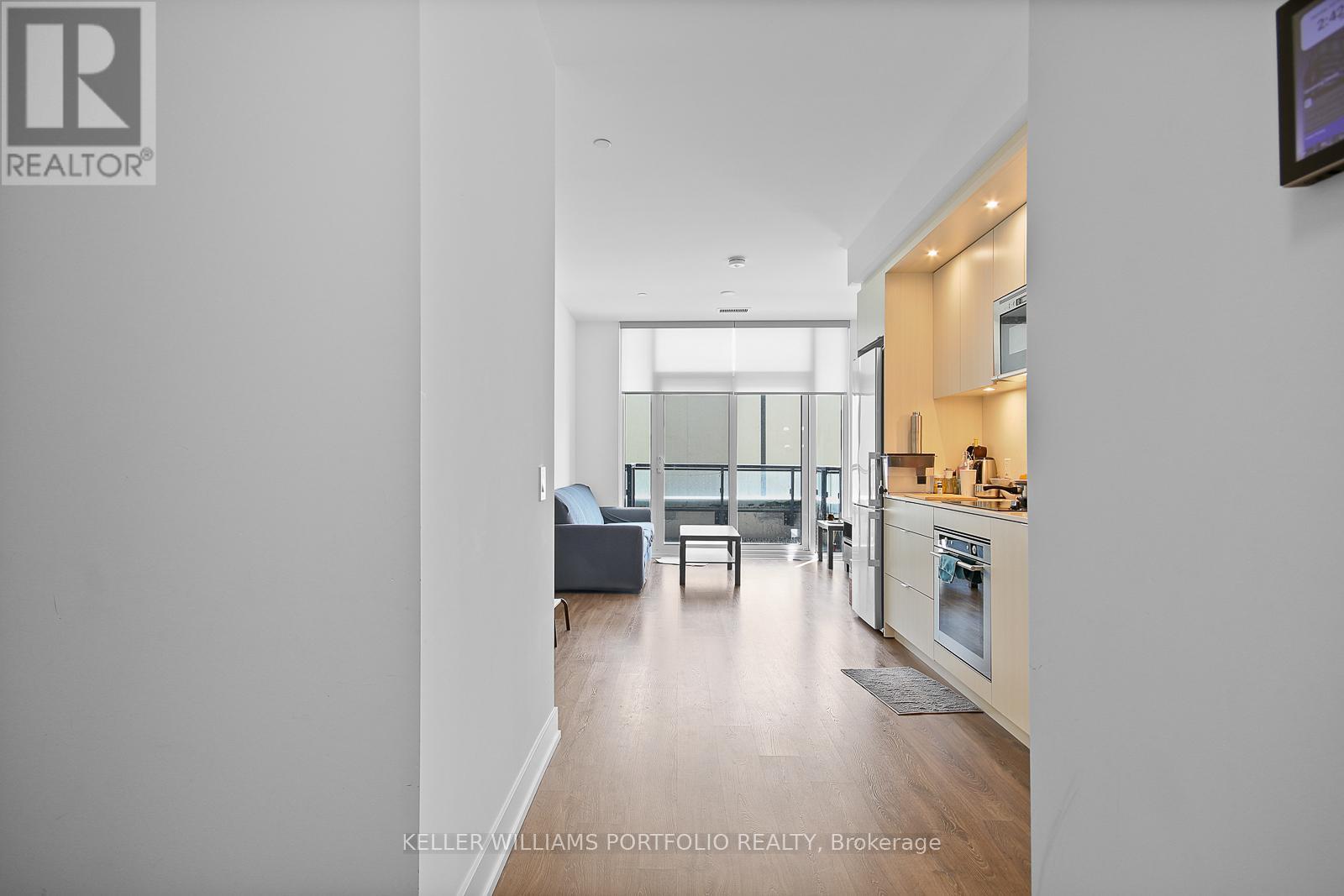 219 - 30 Inn On The Park Drive, Toronto, Ontario  M3C 0P7 - Photo 2 - C12213401