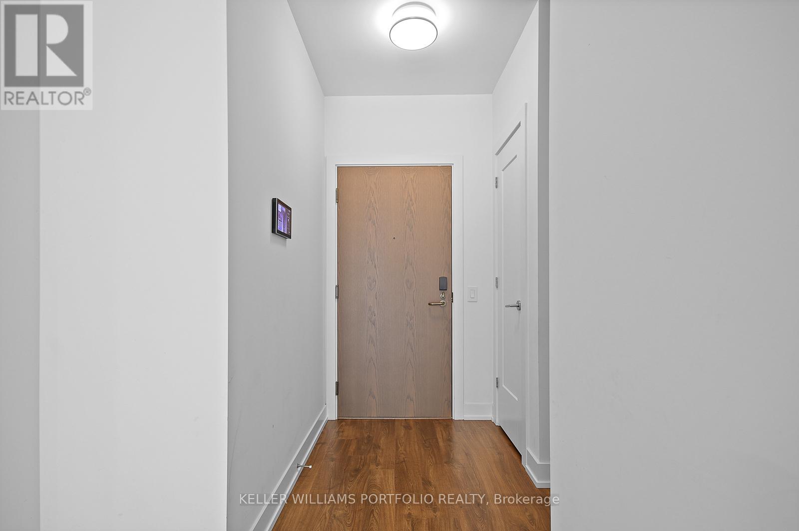 219 - 30 Inn On The Park Drive, Toronto, Ontario  M3C 0P7 - Photo 3 - C12213401