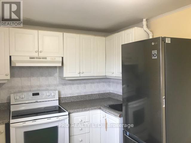 Apt 2 - 128 Gilbert Avenue, Toronto, Ontario  M6E 4W3 - Photo 4 - W12213306