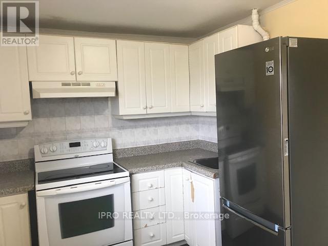 Apt 2 - 128 Gilbert Avenue, Toronto, Ontario  M6E 4W3 - Photo 5 - W12213306