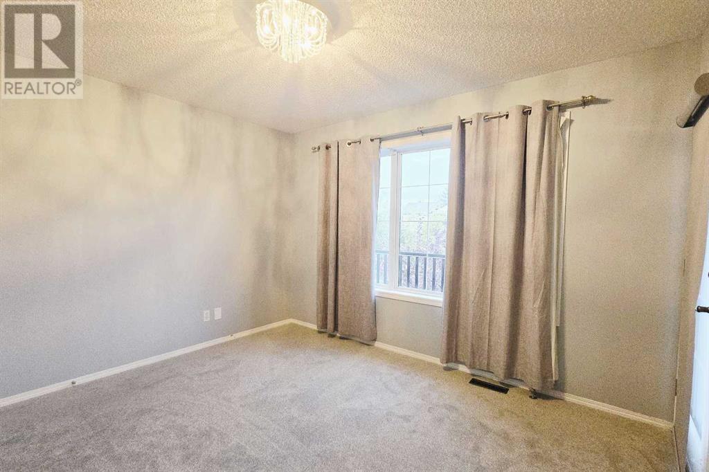 7915 Wentworth Drive Sw, Calgary, Alberta  T3H 4P2 - Photo 23 - A2226100