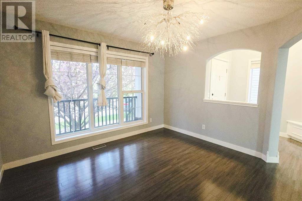 7915 Wentworth Drive Sw, Calgary, Alberta  T3H 4P2 - Photo 11 - A2226100