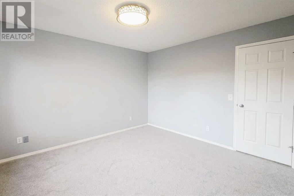 7915 Wentworth Drive Sw, Calgary, Alberta  T3H 4P2 - Photo 16 - A2226100