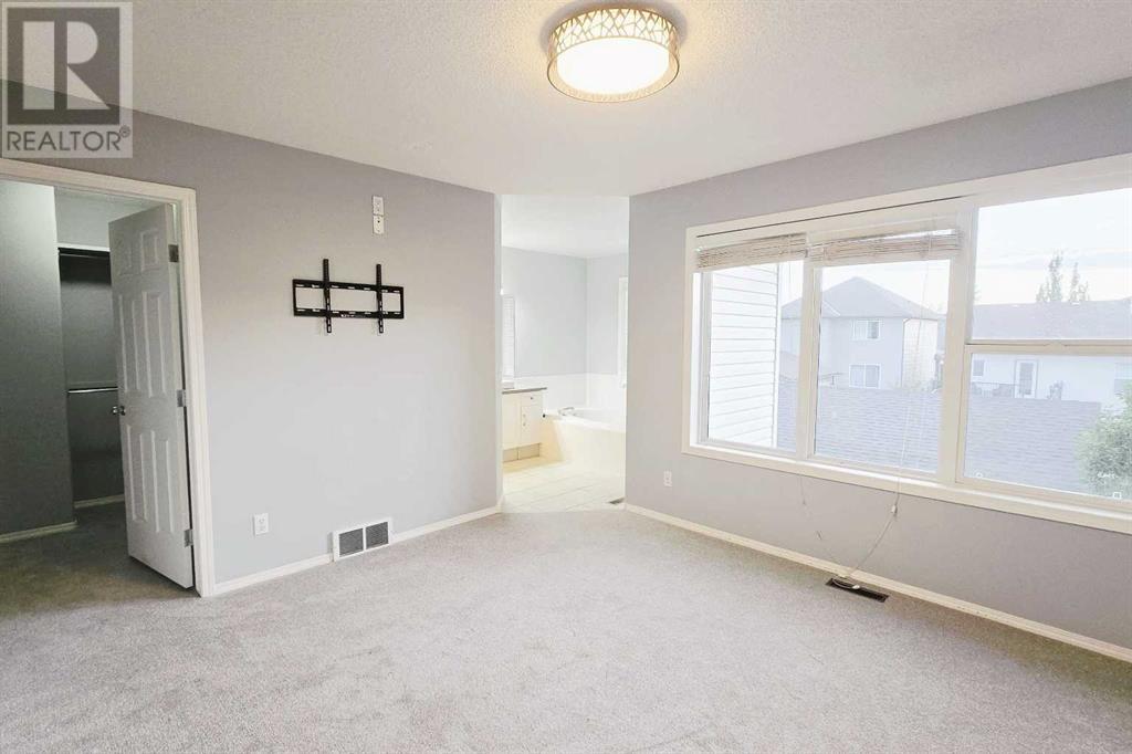 7915 Wentworth Drive Sw, Calgary, Alberta  T3H 4P2 - Photo 15 - A2226100