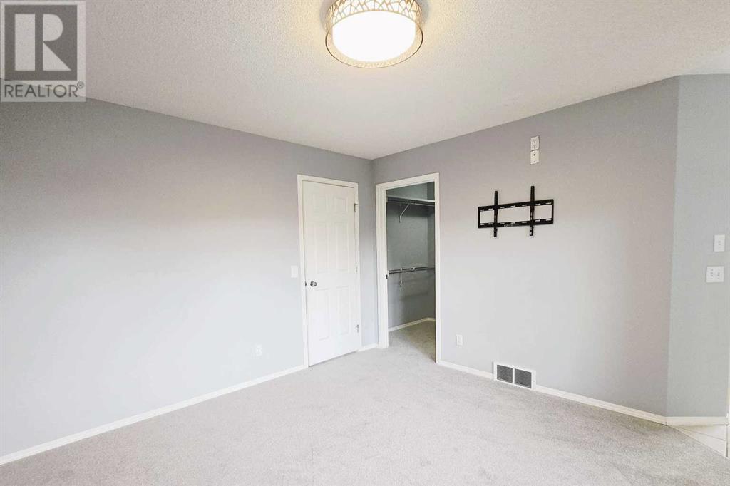 7915 Wentworth Drive Sw, Calgary, Alberta  T3H 4P2 - Photo 17 - A2226100