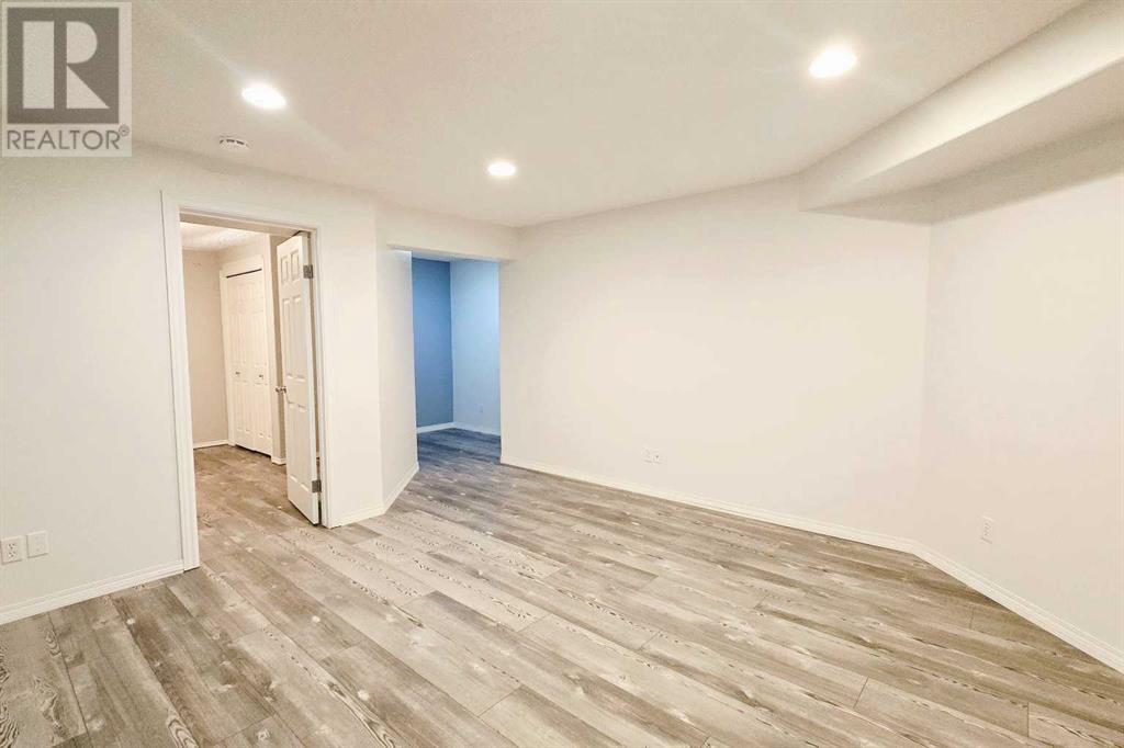 7915 Wentworth Drive Sw, Calgary, Alberta  T3H 4P2 - Photo 30 - A2226100