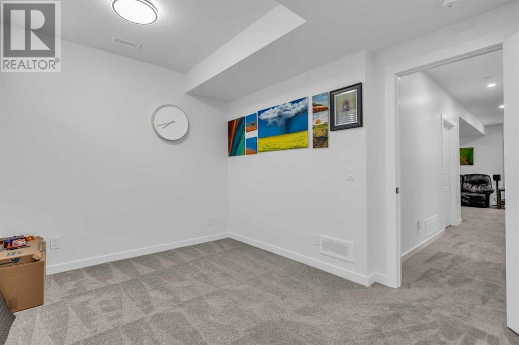 315 Wolf Creek Way Se, Calgary, Alberta  T2X 4Y8 - Photo 32 - A2220594