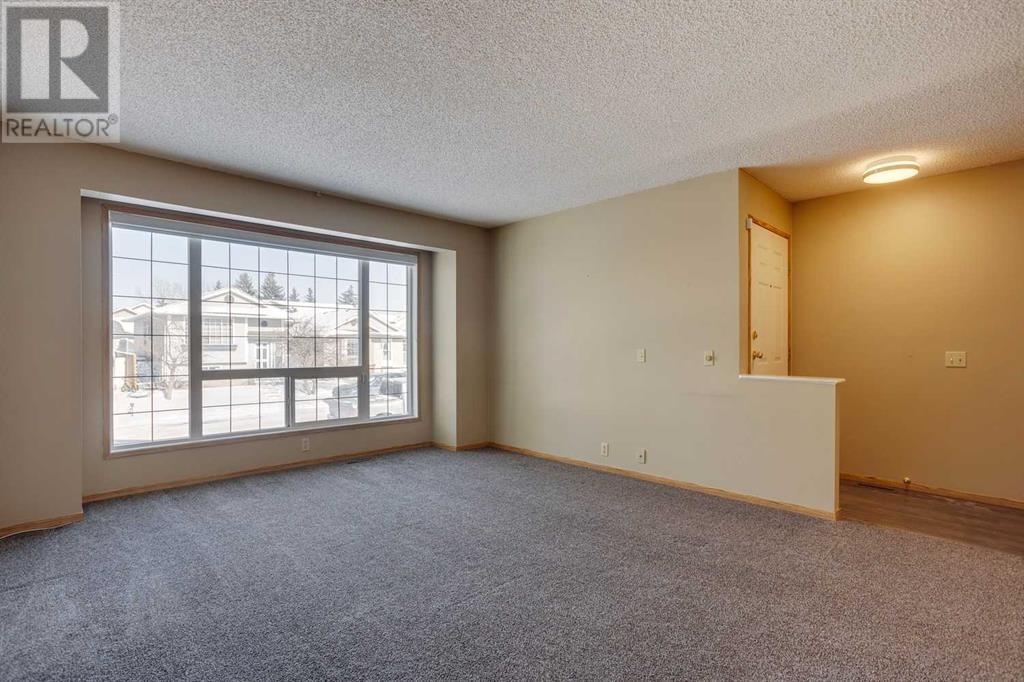 99 Martinwood Road Ne, Calgary, Alberta  T3J 3G7 - Photo 6 - A2195940
