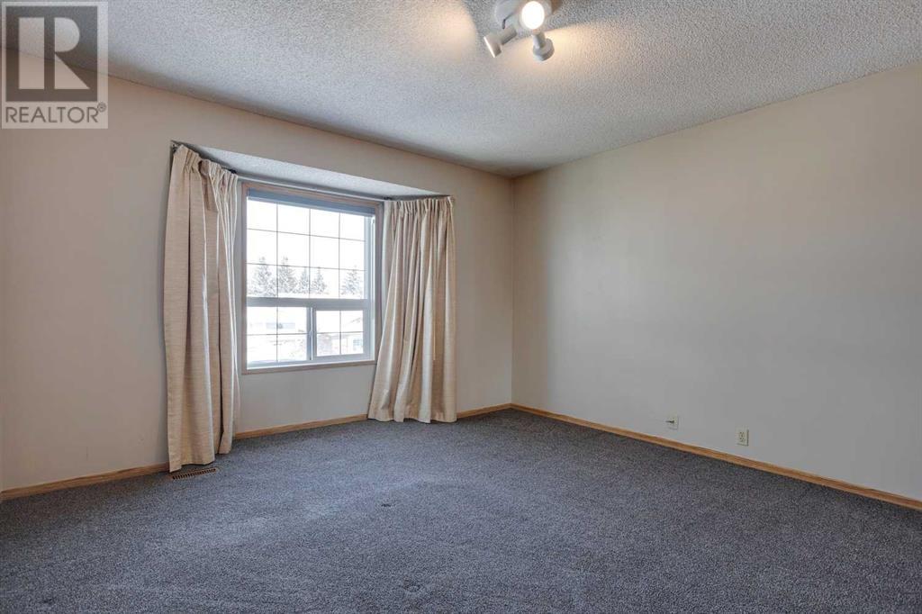 99 Martinwood Road Ne, Calgary, Alberta  T3J 3G7 - Photo 21 - A2195940