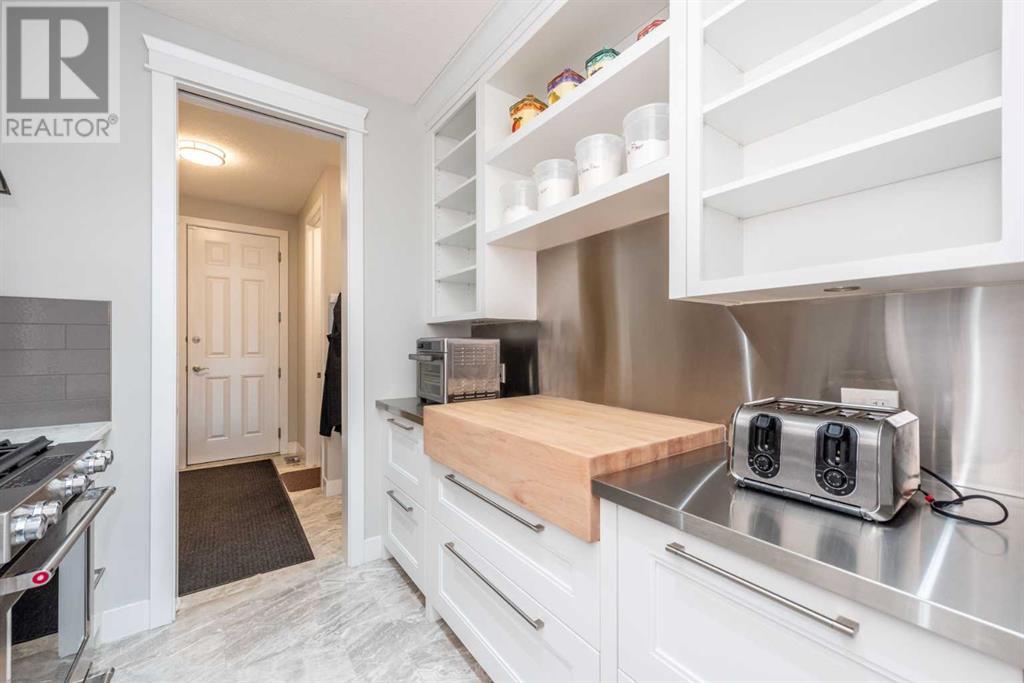 205 Carringvue Manor Nw, Calgary, Alberta  T3P 0W3 - Photo 15 - A2210406