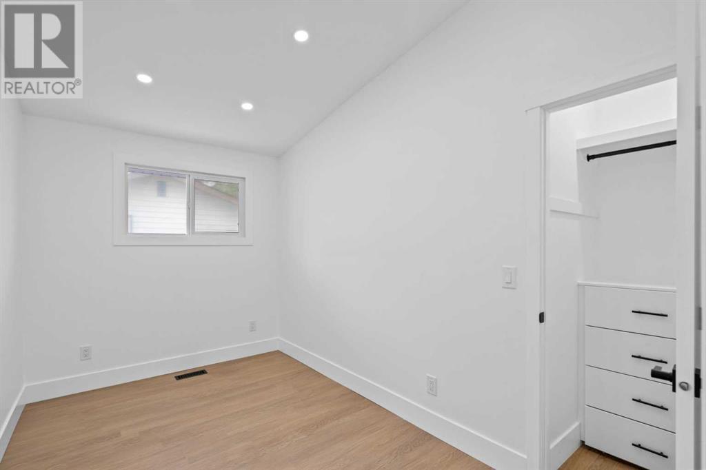 6503 Lombardy Crescent Sw, Calgary, Alberta  T3E 5R3 - Photo 21 - A2223210