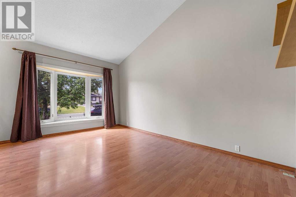 108 Pineland Place Ne, Calgary, Alberta  T1Y 3K2 - Photo 4 - A2228222