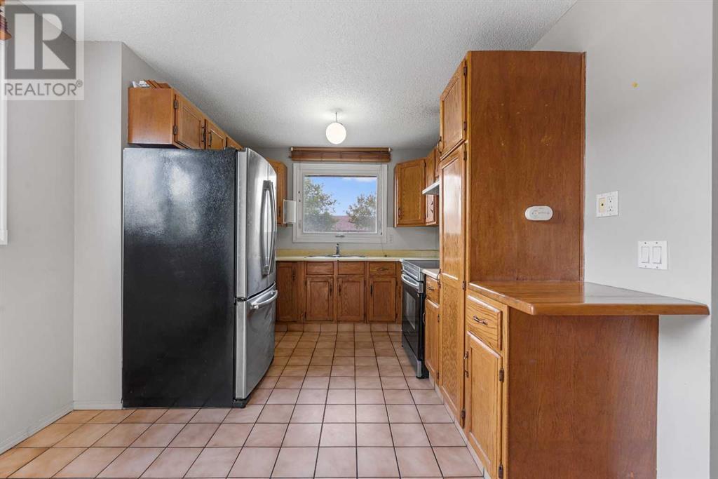 108 Pineland Place Ne, Calgary, Alberta  T1Y 3K2 - Photo 11 - A2228222