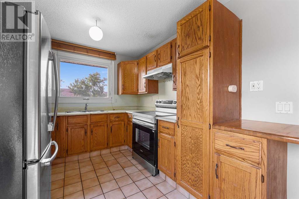 108 Pineland Place Ne, Calgary, Alberta  T1Y 3K2 - Photo 12 - A2228222