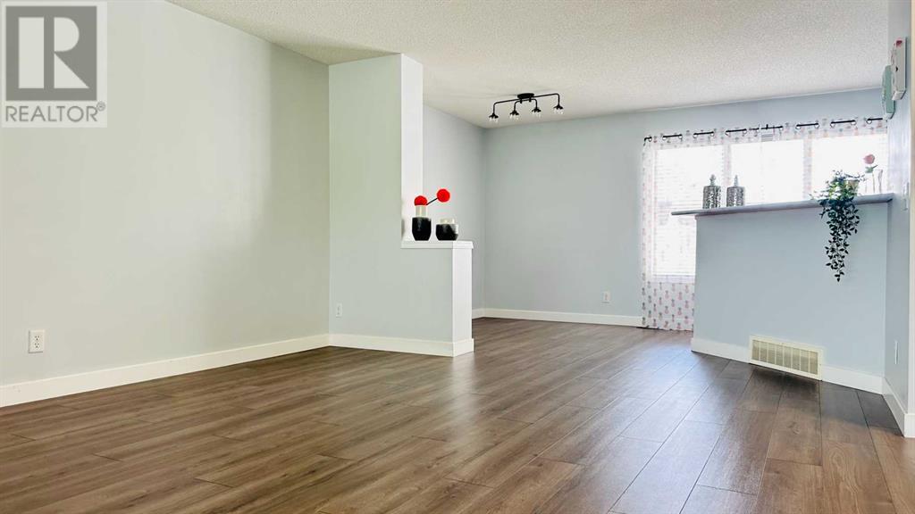 Property at 208 Mckenzie Towne Link SE image 5