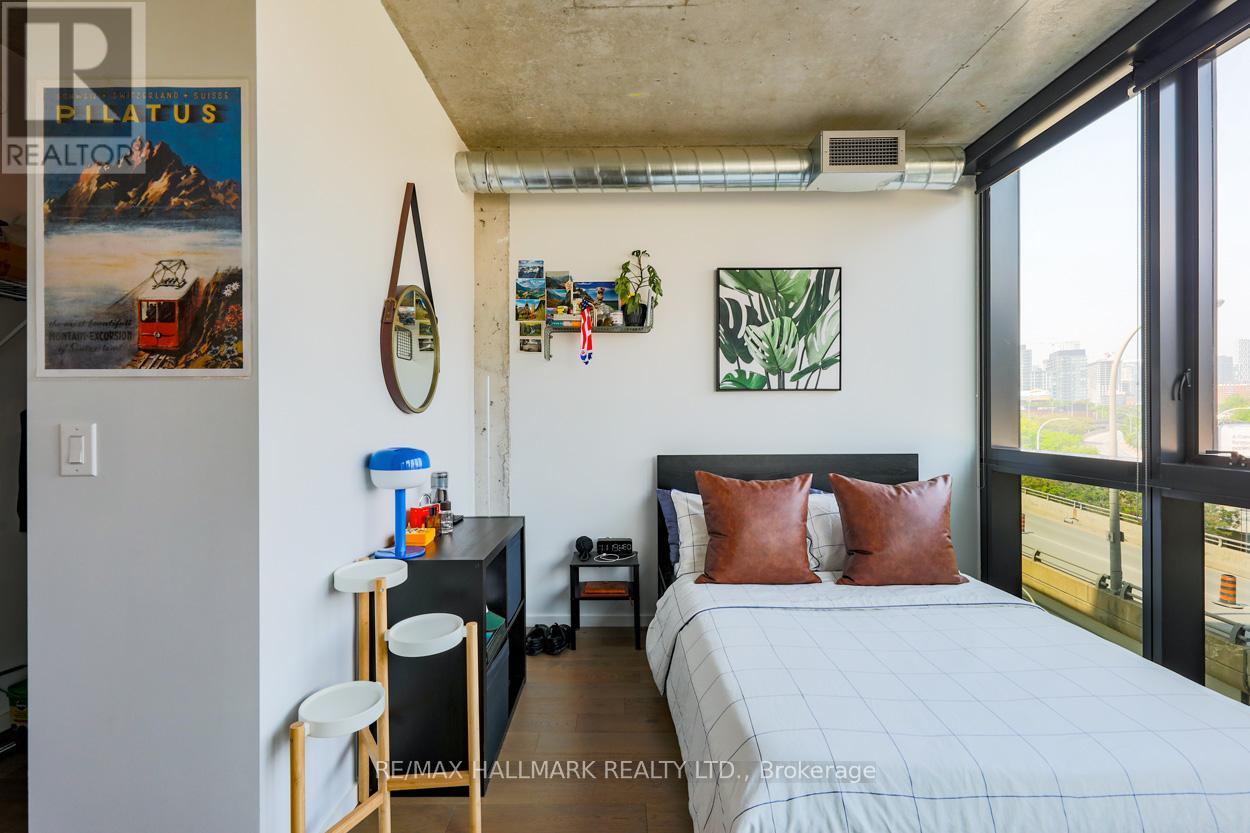 407 - 21 Lawren Harris Square, Toronto, Ontario  M5A 0T4 - Photo 21 - C12182490