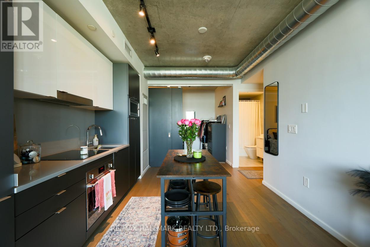 407 - 21 Lawren Harris Square, Toronto, Ontario  M5A 0T4 - Photo 5 - C12182490