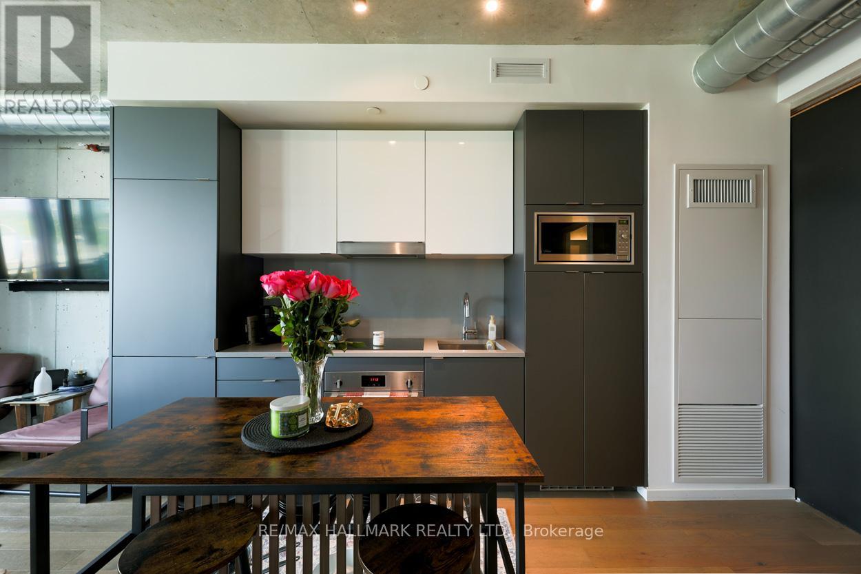 407 - 21 Lawren Harris Square, Toronto, Ontario  M5A 0T4 - Photo 7 - C12182490