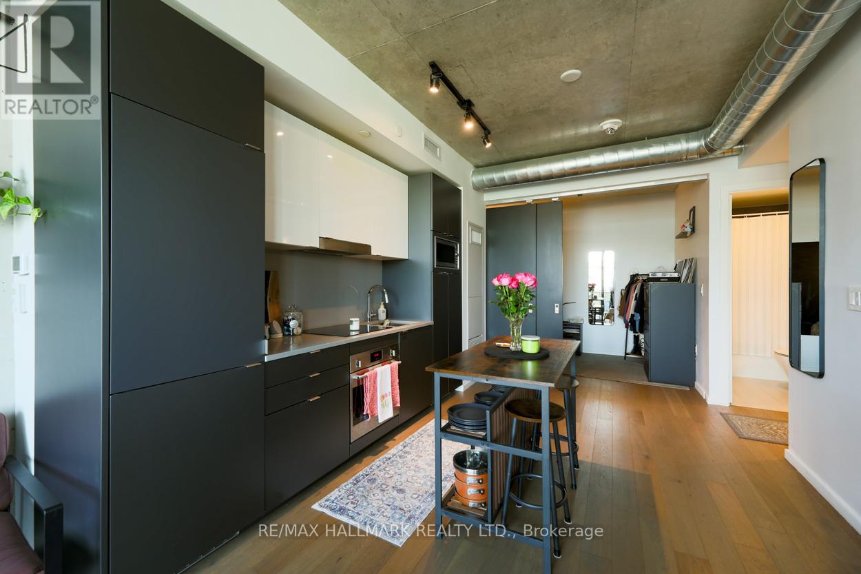 407 - 21 Lawren Harris Square, Toronto, Ontario  M5A 0T4 - Photo 6 - C12182490