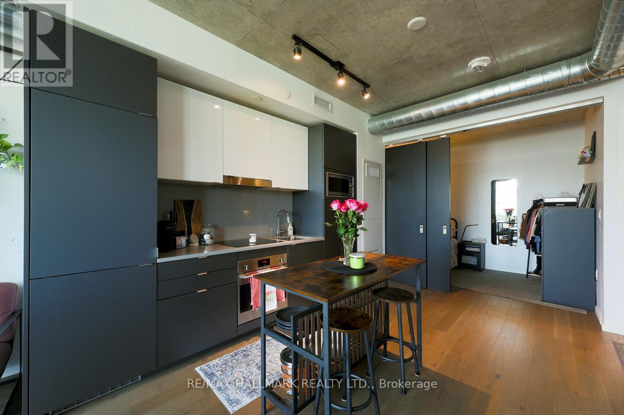 407 - 21 Lawren Harris Square, Toronto, Ontario  M5A 0T4 - Photo 8 - C12182490