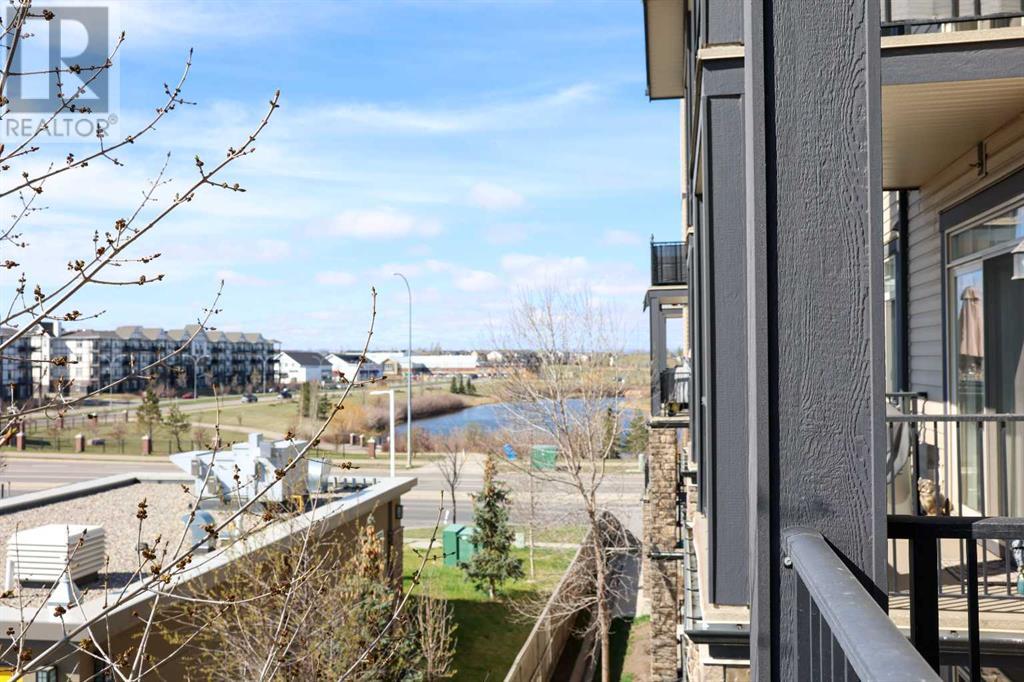 312, 117 Copperpond Common Se, Calgary, Alberta  T2Z 5E2 - Photo 2 - A2214249