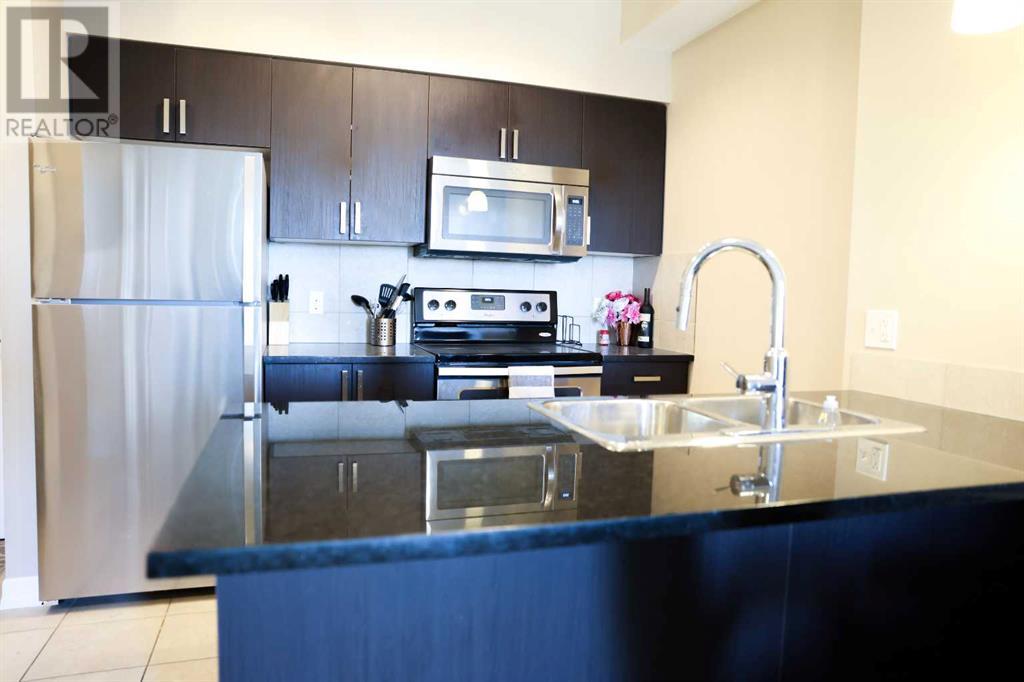 312, 117 Copperpond Common Se, Calgary, Alberta  T2Z 5E2 - Photo 5 - A2214249