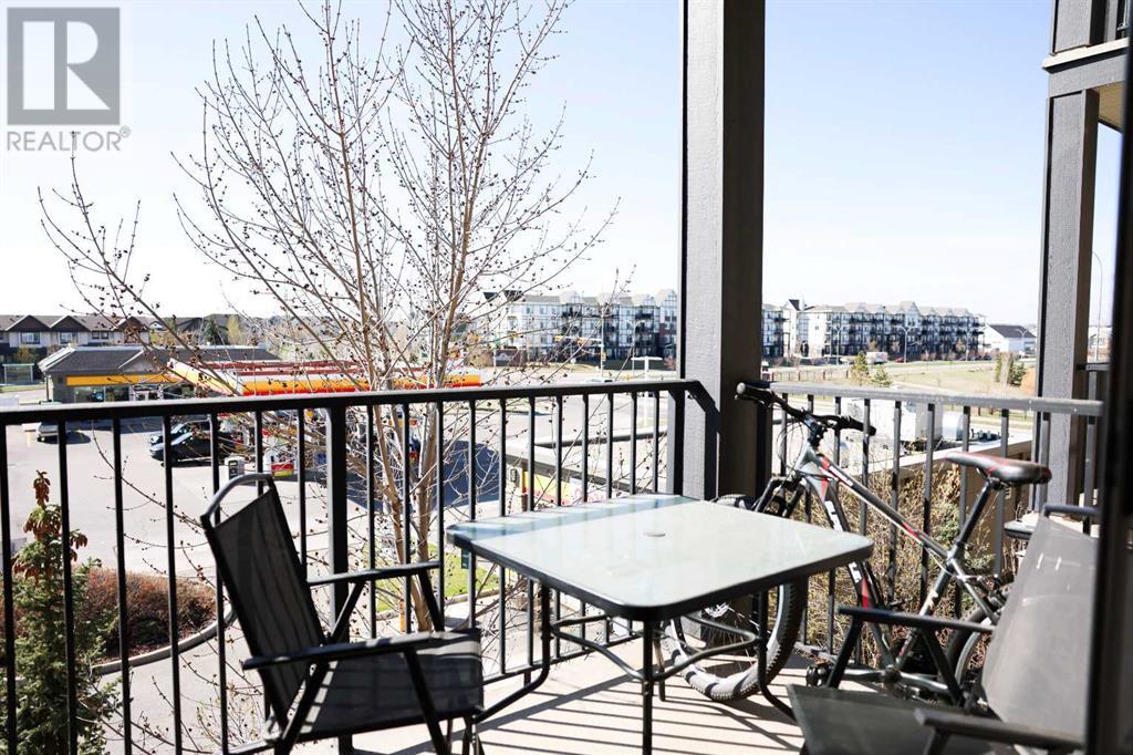 312, 117 Copperpond Common Se, Calgary, Alberta  T2Z 5E2 - Photo 1 - A2214249