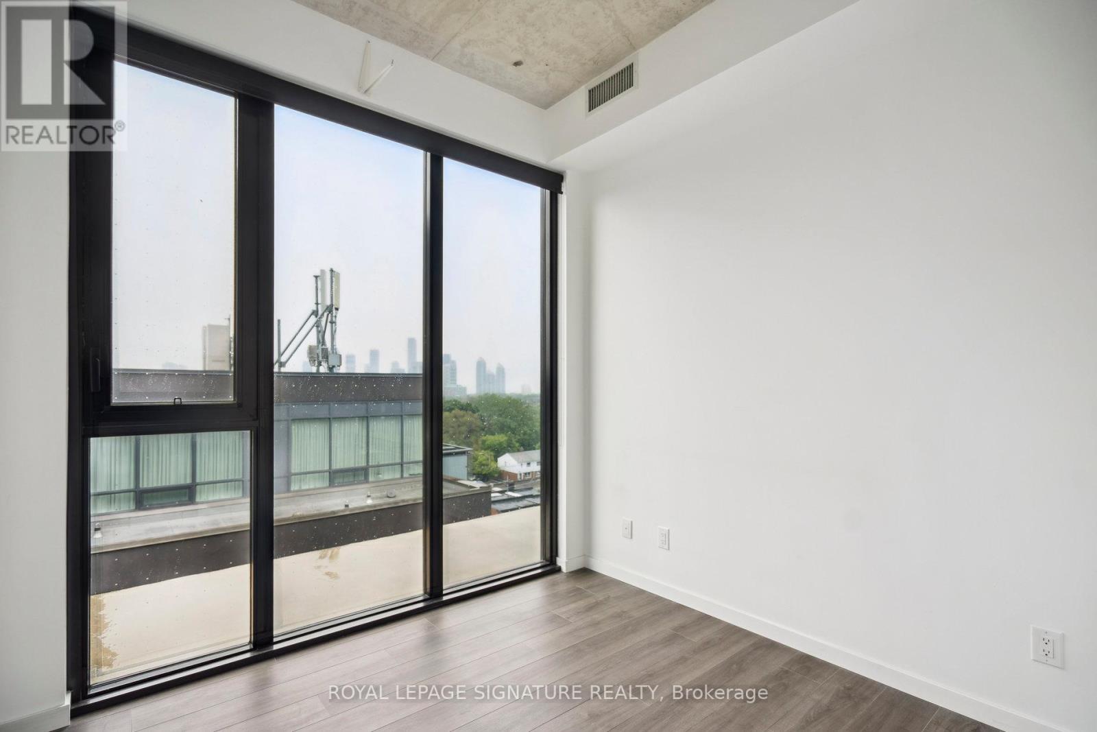 808 - 7 Smith Crescent, Toronto, Ontario  M8Z 0G3 - Photo 5 - W12214585
