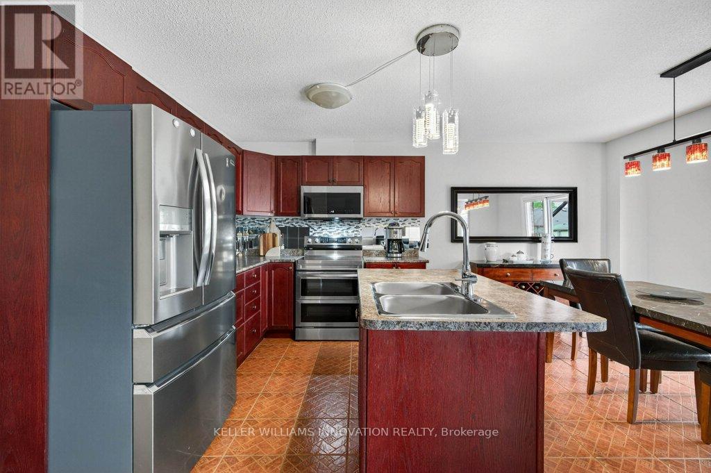324 Beaumont Crescent, Kitchener, Ontario  N2A 0A7 - Photo 4 - X12214582
