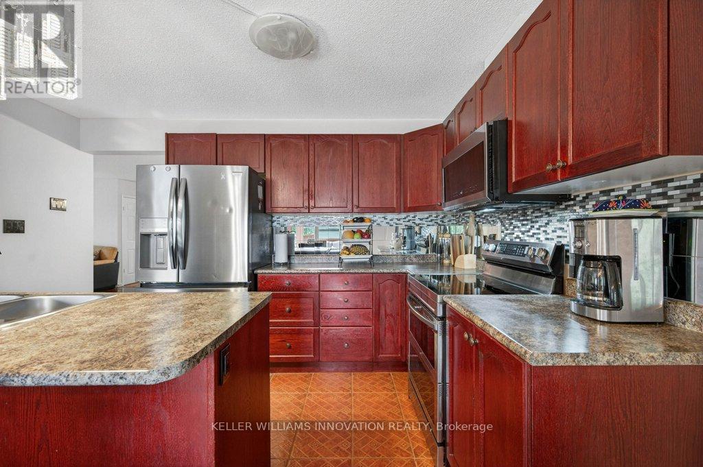 324 Beaumont Crescent, Kitchener, Ontario  N2A 0A7 - Photo 6 - X12214582