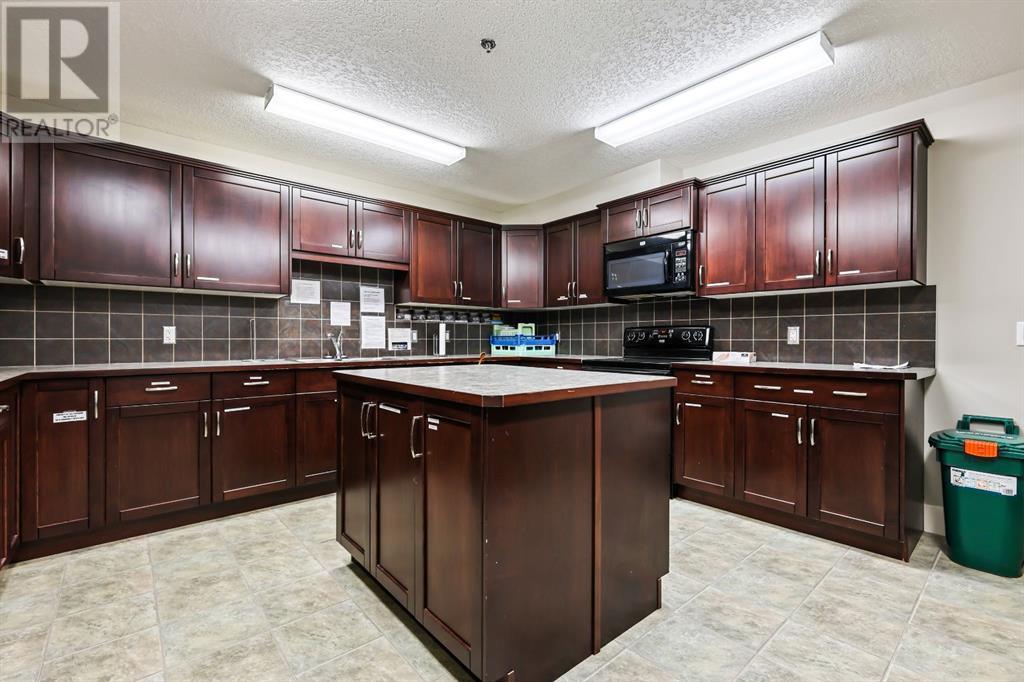 107, 77 George Fox Trail, Cochrane, Alberta  T4C 0N1 - Photo 26 - A2227519