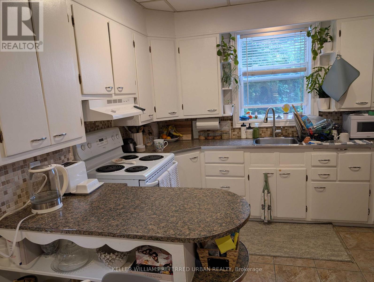 Main - 591 Jane Street, Toronto, Ontario  M6S 4A3 - Photo 2 - W12206622