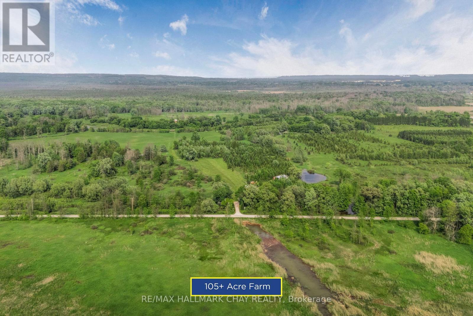 9205 Mckinnon Road, Essa (Angus), Ontario  L3W 0V9 - Photo 4 - N12210362