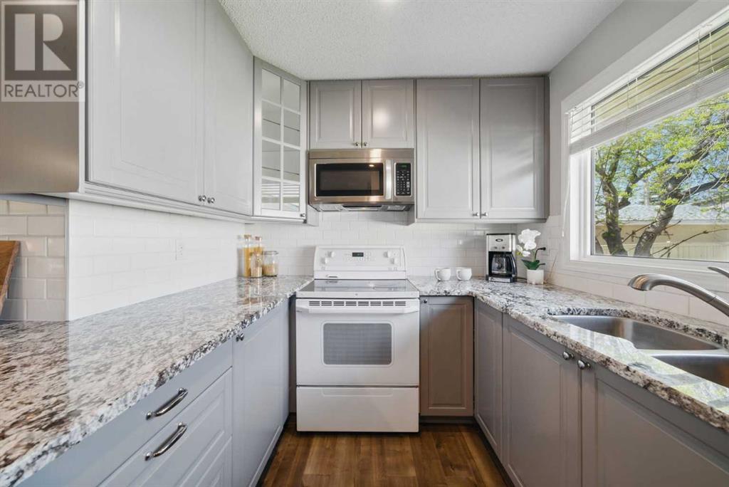 828 Hunterston Crescent Nw, Calgary, Alberta  T2K 4N2 - Photo 10 - A2215364