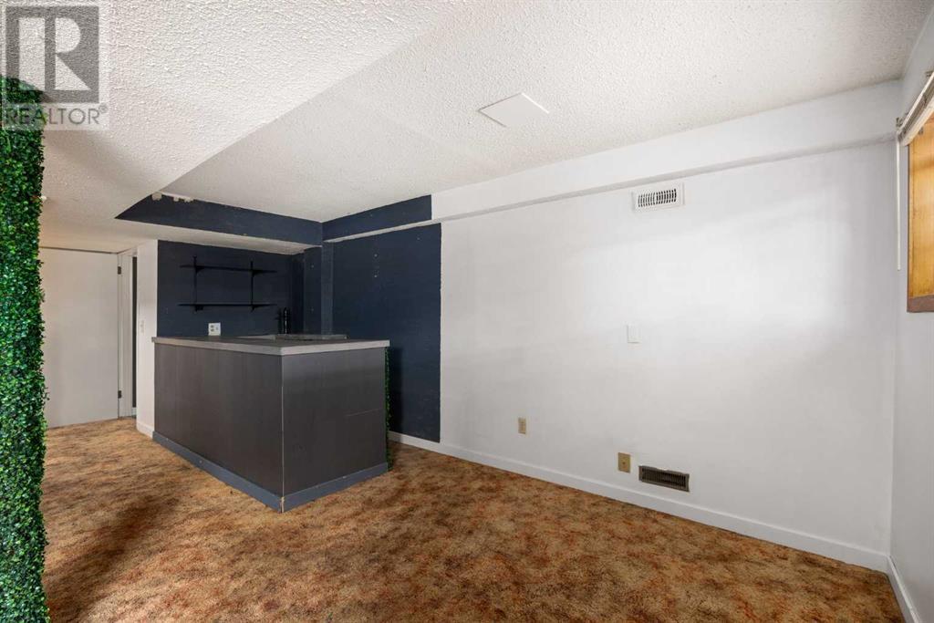 92 Erin Woods Drive Se, Calgary, Alberta  T2B 2S1 - Photo 28 - A2222354