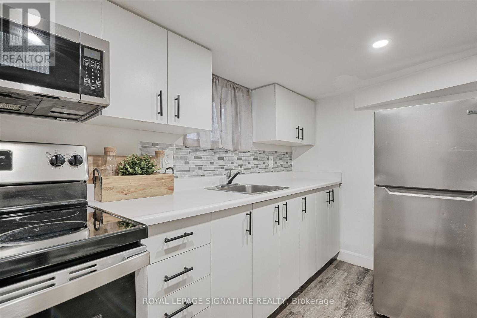 58 Livingstone Avenue, Toronto, Ontario  M6E 2L8 - Photo 32 - W12205012