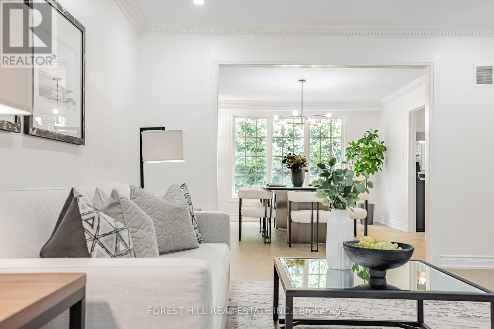 <div class="slider-price">$2,499,000</div><p>37 Abbeywood Trail, Toronto, Ontario</p>