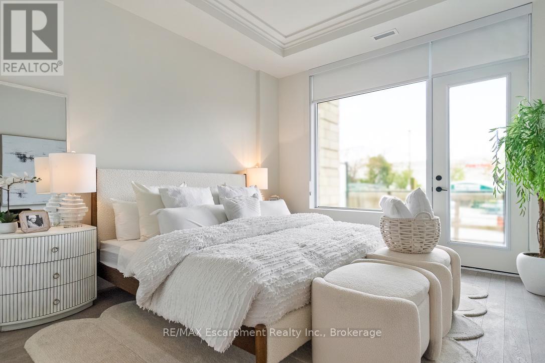 105 - 123 Maurice Drive, Oakville, Ontario  L6K 2W6 - Photo 12 - W12213843