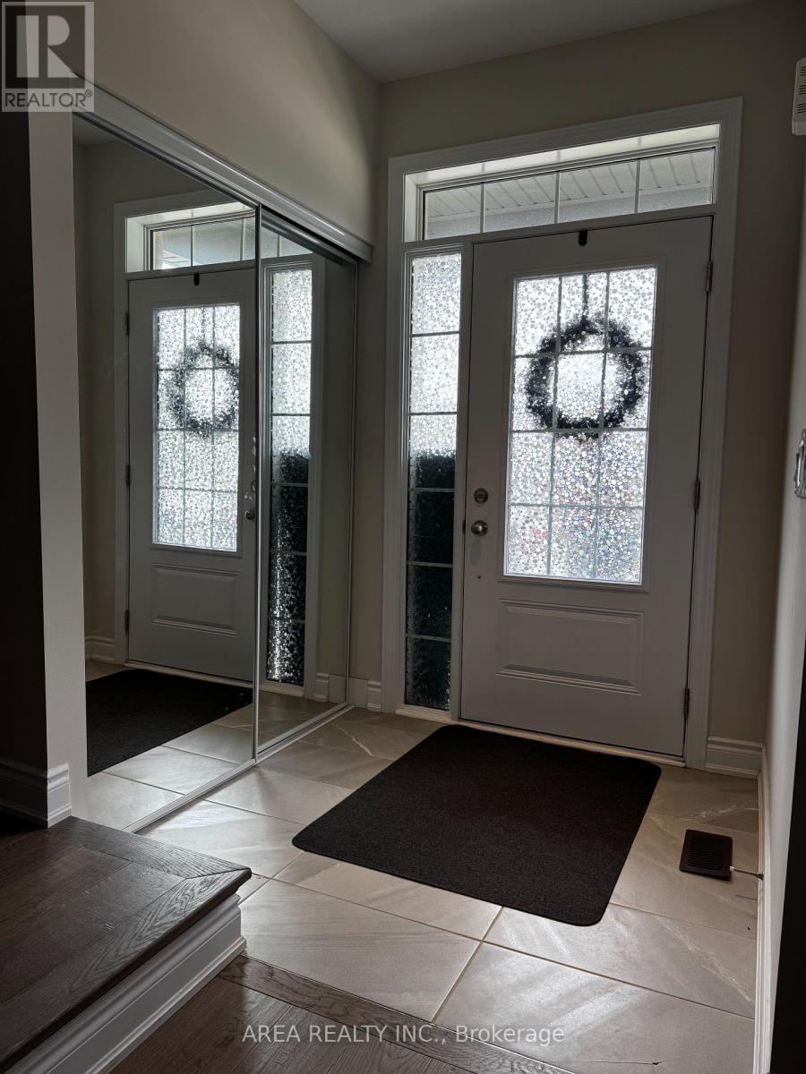 64 Stately Drive, Wasaga Beach, Ontario  L0M 1S0 - Photo 2 - S12216946