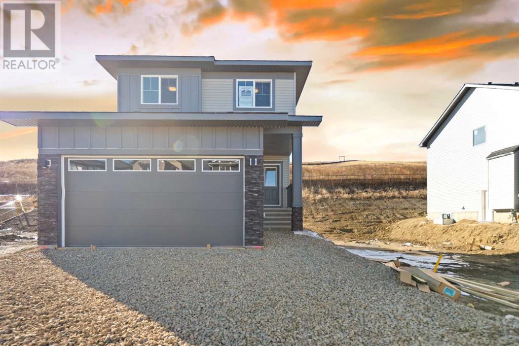 1055 Fowler Road Sw, Airdrie, Alberta  T4B 0B7 - Photo 1 - A2220853