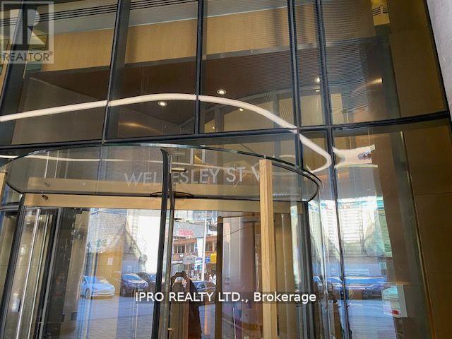 1912 - 11 Wellesley Street W, Toronto, Ontario  M4Y 0G4 - Photo 2 - C12217252